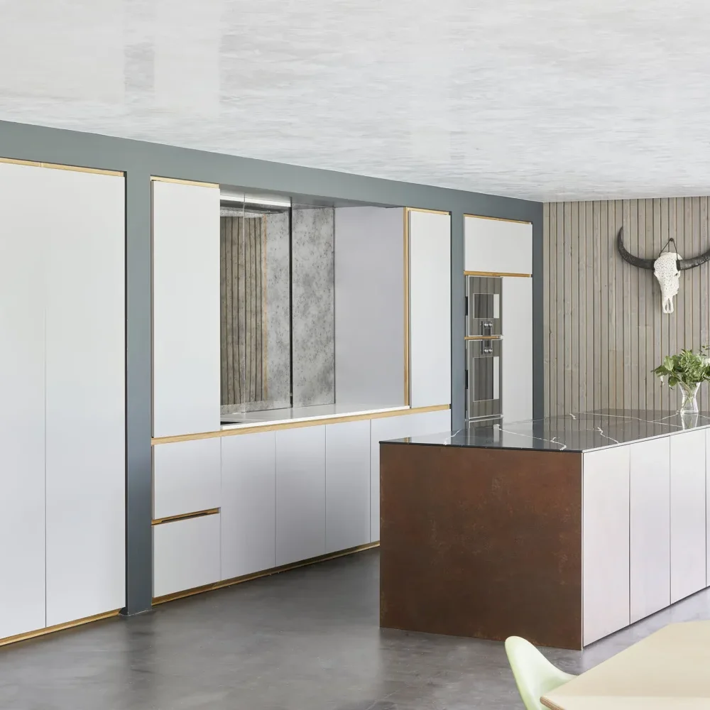 Dust_Apple_Tree_26-copy a kitchen with a table and white cabinets