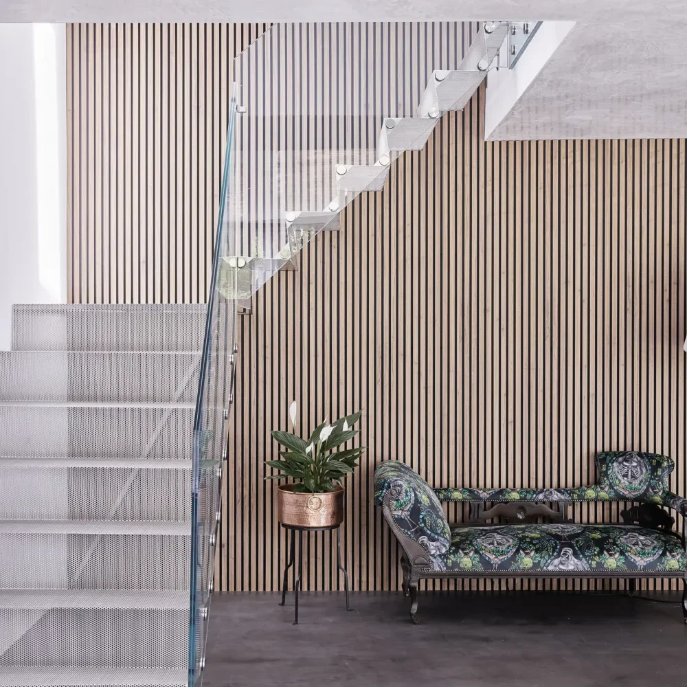 Dust_Apple_Tree_29-copy a staircase with a couch and plant in front of it