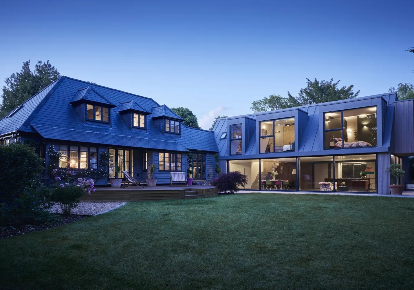 a house with a lawn and a patio