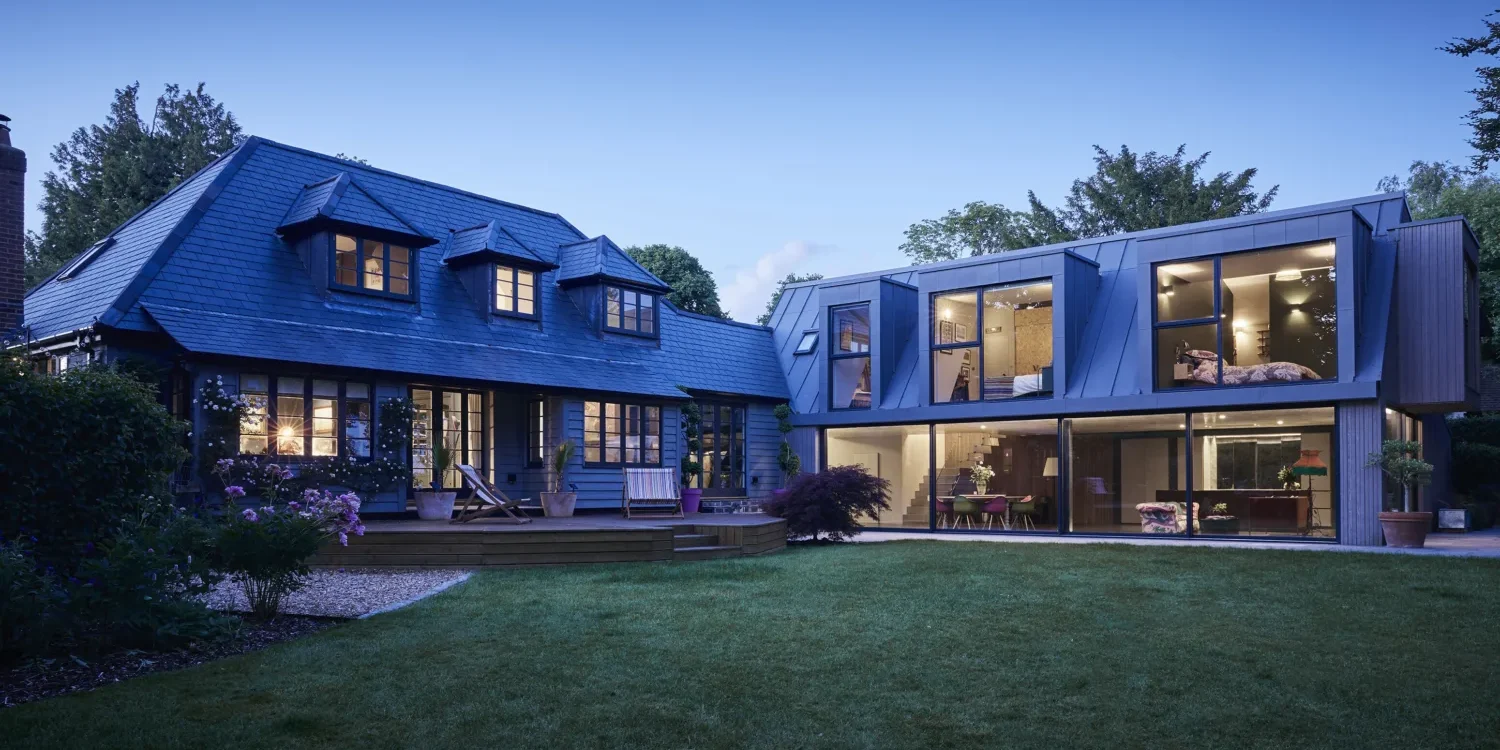 a house with a lawn and a patio